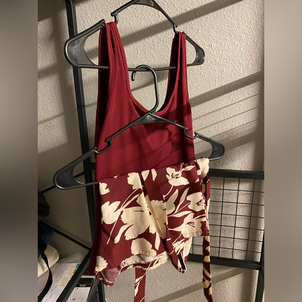 Burgundy Floral Romper never worn and soft material with matching belt